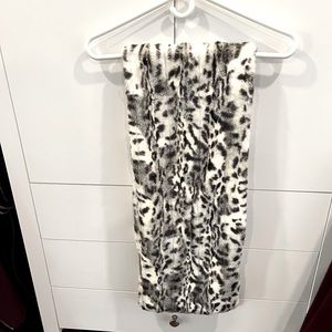 Leopard print shawl ,55 inches long , opening for easier wrap on one side.